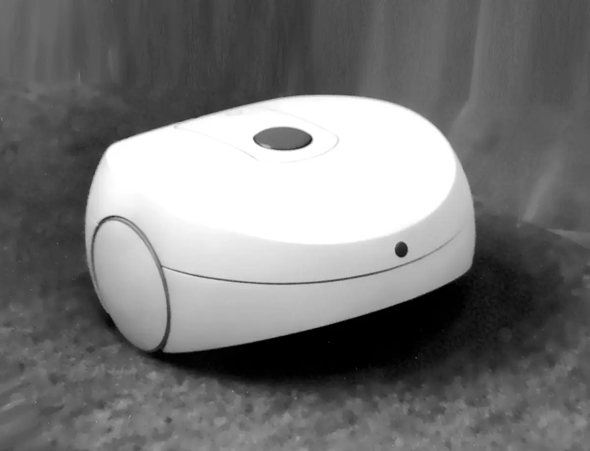 Machetă albă a unui aspirator robot, studiu de design din 1994